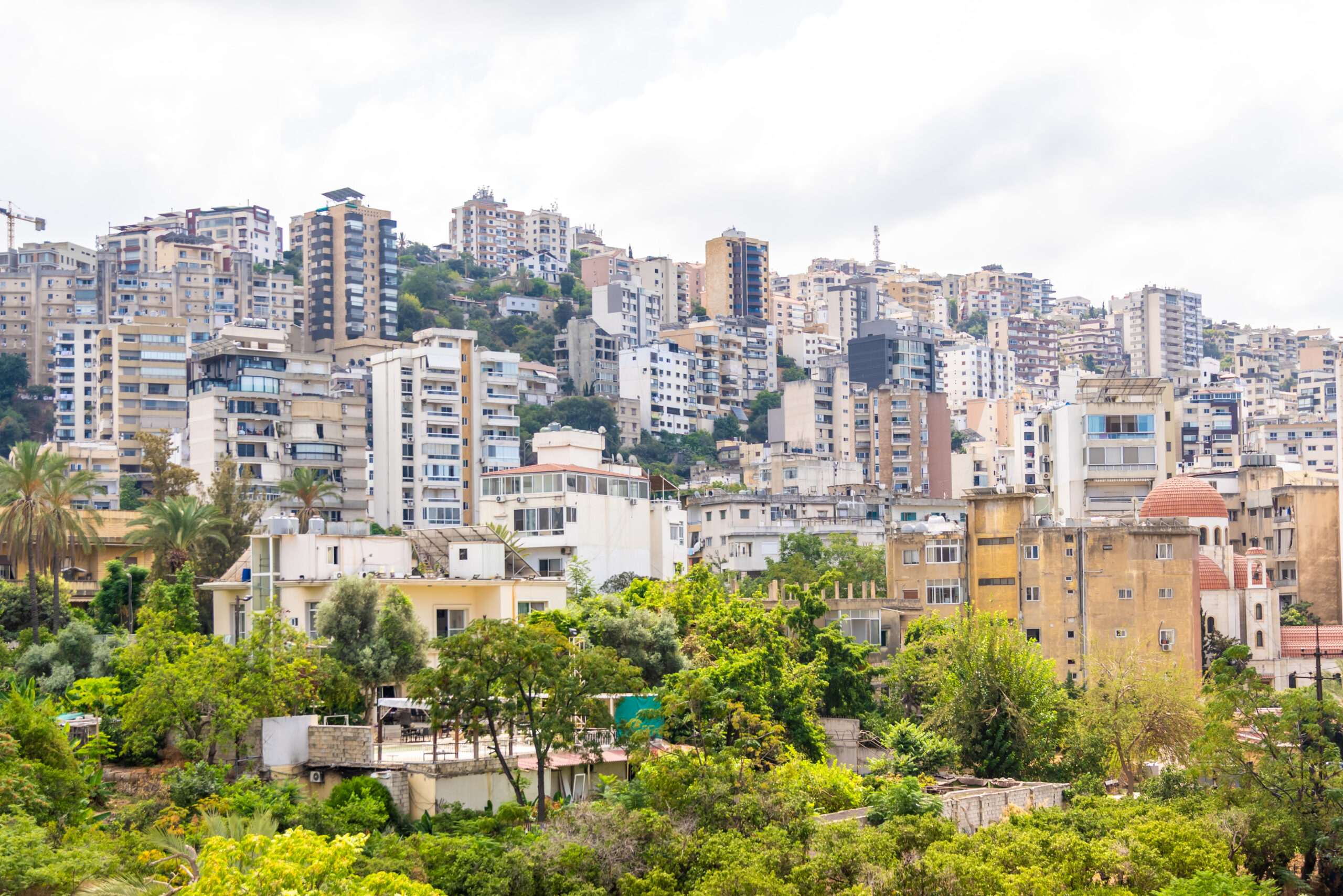 Aerial view of Beirut Lebanon cityscape with buildings climbing the hillside